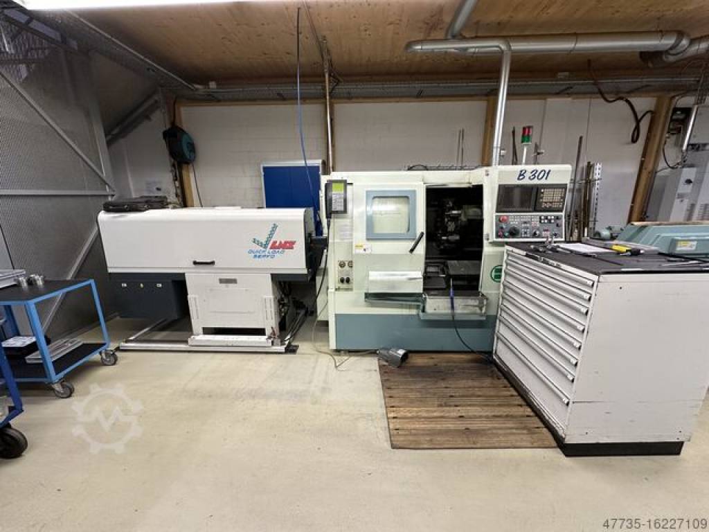 CNC Lathe with bar feeder BIGLIA B 301 Ababil Marine